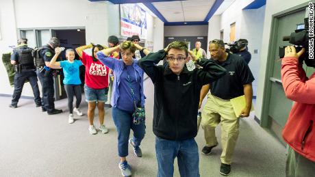 Students take part in an active shooter response training exercise at a Fountain, Colorado, middle school in 2017. 