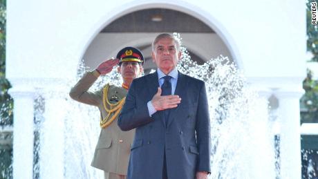 Pakistani Prime Minister Shehbaz Sharif gestures during an honor guard ceremony in Islamabad on April 12, 2022. 