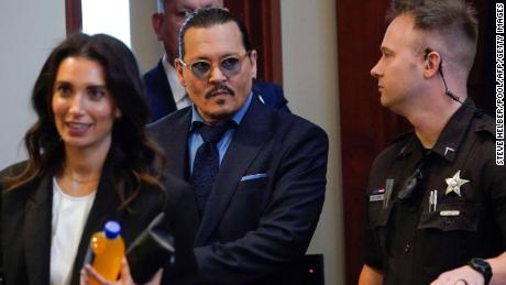 Johnny Depp arrived Friday to wrap up the debate.