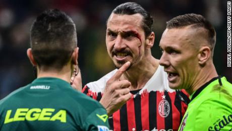Ibrahimović reacts after being injured following a collision during a Serie A soccer match between AC Milan and Bologna on April 4, 2022 at the San Siro stadium.