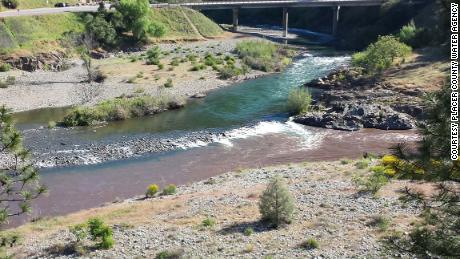 The confluence of the Middle and North Forks of the American River in Placer County. The Middle Fork, bottom, carried the ash and burned soil from the King Fire and merged with the clean North Fork. 