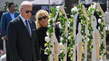 President Joe Biden and first lady Jill Biden pay their respects at a makeshift memorial outside of Robb Elementary School in Uvalde, Texas, on Sunday.