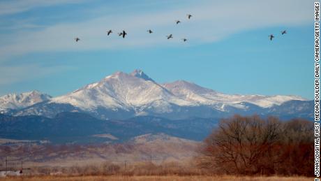 Longs Peak and Mount Meeker are seen in this 2016 file photo.