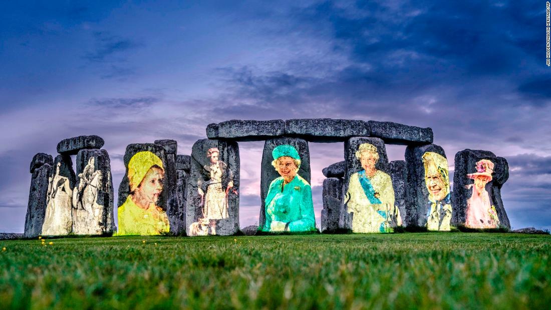 ‘Completely unhenged’: Stonehenge lights up with portraits of the Queen