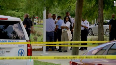 Gunfire erupts after a high school graduation ceremony, killing an elderly woman on the Xavier University campus