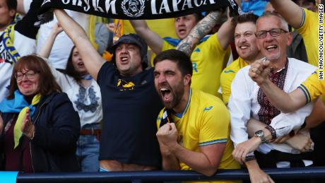 Ukraine fans celebrate after Andriy Yarmolenko scored their side&#39;s first goal against Scotland.