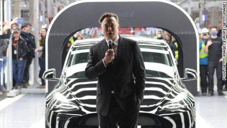 GRUENHEIDE, GERMANY - MARCH 22: Tesla CEO Elon Musk speaks during the official opening of the new Tesla electric car manufacturing plant on March 22, 2022 near Gruenheide, Germany. The new plant, officially called the Gigafactory Berlin-Brandenburg, is producing the Model Y as well as electric car batteries. (Photo by Christian Marquardt - Pool/Getty Images)
