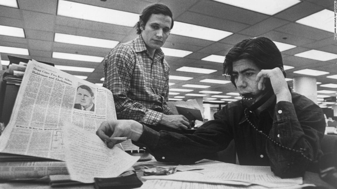 Washington Post staff writers Bob Woodward, left, and Carl Bernstein were covering the Watergate case. With the help of a source known as &quot;Deep Throat,&quot; later identified as FBI official Mark Felt, they wrote a series of groundbreaking articles on the scandal.