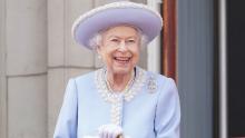 Queen Elizabeth II watches from the balcony of Buckingham Palace during the Trooping the Colour parade in London on Thursday, June 2.