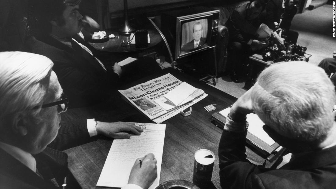 White House reporters watch Nixon on TV on April 30, 1973, as the President told the nation of White House involvement in the Watergate scandal. Four of Nixon&#39;s top officials resigned: White House counsel John Dean, Chief of Staff H.R. Haldeman, assistant for domestic affairs John D. Ehrlichman and Attorney General Richard Kleindienst.