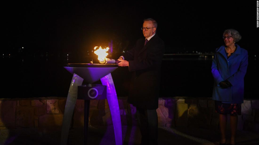 Australian Prime Minister Anthony Albanese lights the Commonwealth Beacon for a jubilee celebration in Canberra, Australia, on Thursday.