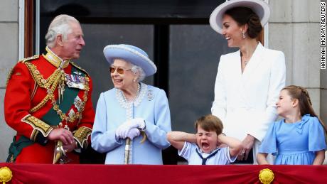Britain&#39;s Queen Elizabeth, Prince Charles and Catherine, Duchess of Cambridge, along with Princess Charlotte and Prince Louis appear on the balcony of Buckingham Palace.