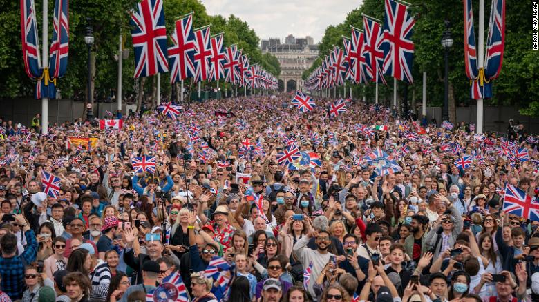People pack The Mall as the royal family reaches the balcony of Buckingham Palace on Thursday.