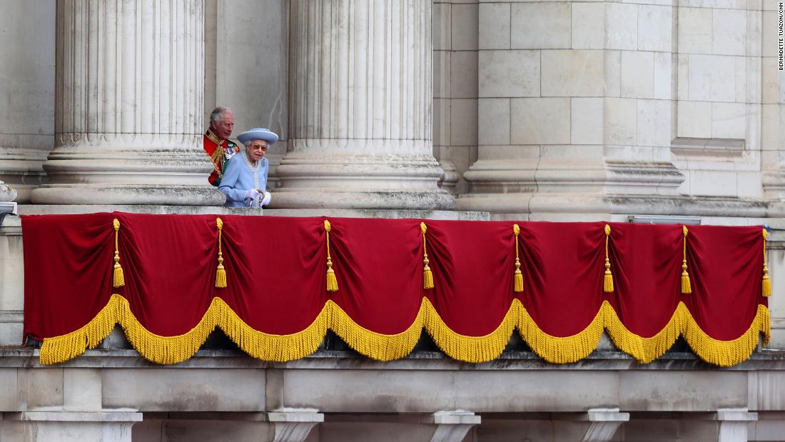 The Queen walks out onto the Buckingham Palace balcony during the Trooping the Colour parade.