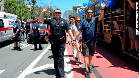 San Francisco policemen walk in the 2019 San Francisco Pride Parade and Celebration.