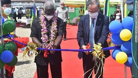 China&#39;s ambassador to the Solomon Islands Li Ming and Solomons Prime Pinister Manasseh Sogavare at the opening ceremony of a China-funded national stadium complex in Honiara on April 22, 2022.