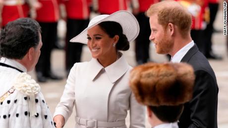 Queen misses anniversary service attended by Harry and Meghan because Boris Johnson was booed