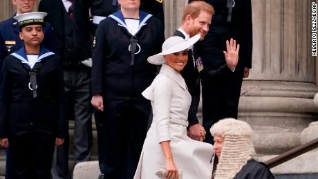 Prince Harry and Meghan, Duchess of Sussex, arrive for a service of thanksgiving for the reign of Queen Elizabeth II at St Paul&#39;s Cathedral in London on Friday.