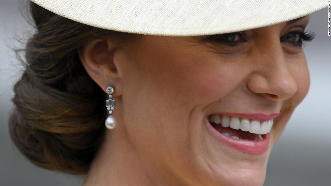 Catherine, the Duchess of Cambridge, smiles as she arrives at St Paul&#39;s Cathedral on Friday.