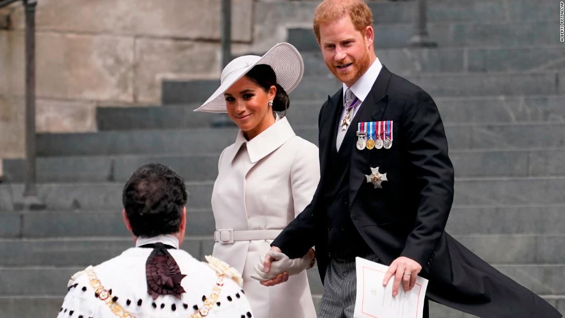 Prince Harry and his wife Meghan, the Duchess of Sussex, depart St Paul&#39;s Cathedral in London after attending a service honoring the Queen on Friday. Harry and Meghan, who flew from the United States for the jubilee celebrations, were warmly welcomed by a crowd outside the service. Ahead of the event, there was much speculation in the British press over how the couple would be received following their decision to step back from the royal family and move to California two years ago.