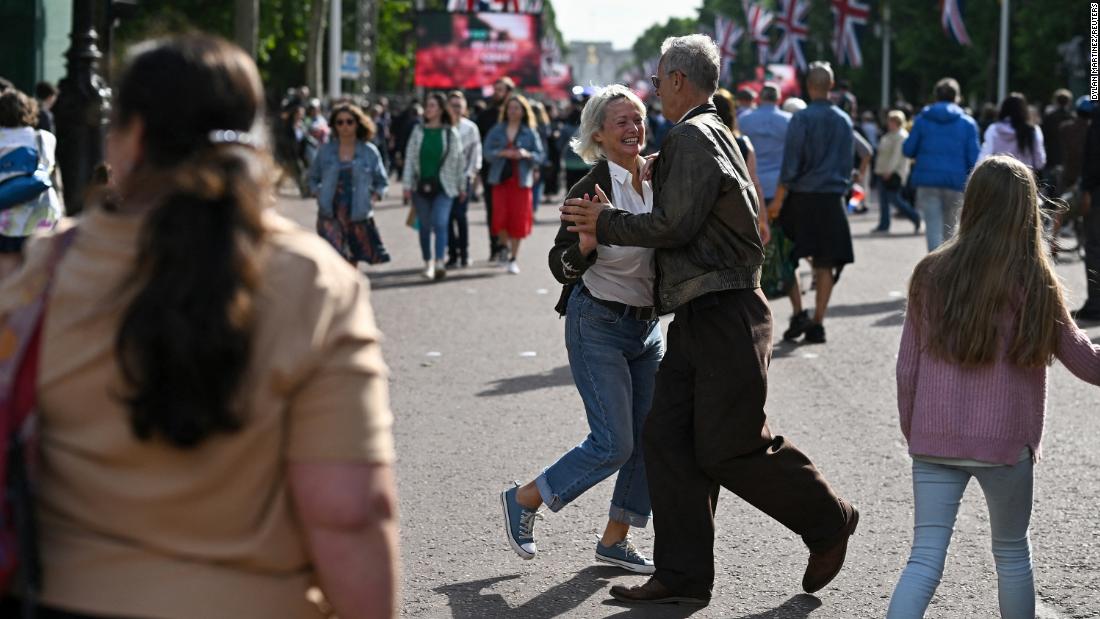 People dance during jubilee celebrations in London on Saturday. 