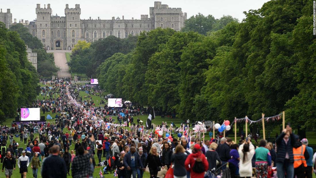 People gather outside Windsor Castle for the Big Jubilee Lunch there on Sunday.