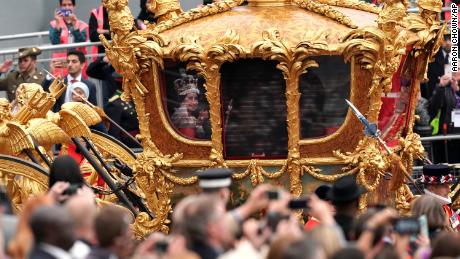 A hologram of Queen Elizabeth II during her coronation in the Gold State Coach during the Platinum Jubilee Pageant outside Buckingham Palace in London, Sunday June 5, 2022, on the last of four days of celebrations to mark the Platinum Jubilee. The pageant will be a carnival procession up The Mall featuring giant puppets and celebrities that will depict key moments from the Queen Elizabeth II&#39;s seven decades on the throne.