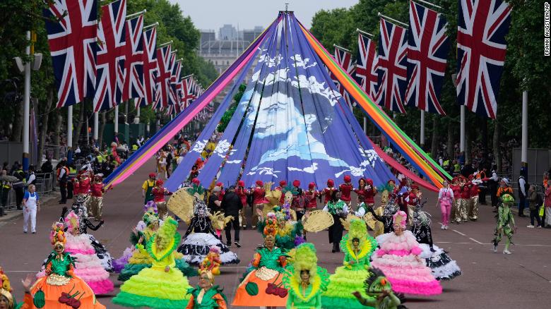 Sunday&#39;s pageant featured a carnival procession along the Mall including giant puppets and celebrities that helped depicted key moments from the Queen&#39;s seven decades on the throne. 