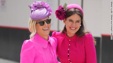 Princess Anne's daughter Zara Tindall and Lady Frederick Windsor looked giddy in pink dresses and ornate fascinators.