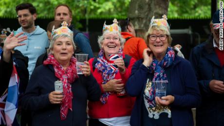 The Bolton sisters -- George, Jack and Jo -- sport Burger King crowns. &quot;We are royal fans and excited about the parade,&quot; George said. &quot;It's very important to be here. She's been the Queen my whole life.&quot;