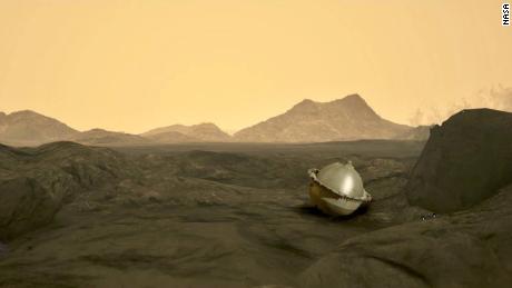 Ilustrasi ini menunjukkan probe setelah mencapai permukaan Venus.  Ketinggian bunga dapat dilihat di latar belakang.