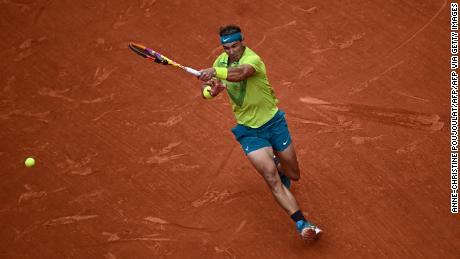 Nadal plays a forehand against Ruud in the French Open final. 