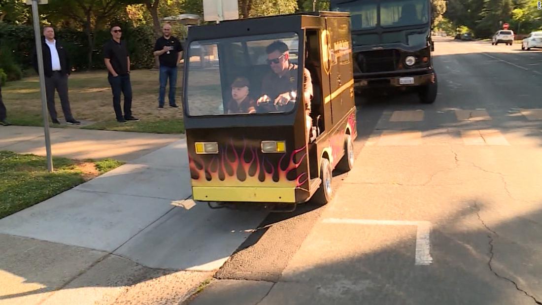 7-year-old boy surprised with mini UPS truck  – CNN Video