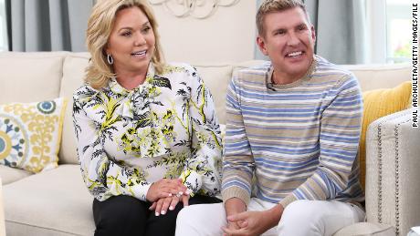 Reality TV personalities Julie Chrisley, left, and Todd Chrisley visit Hallmark&#39;s &quot;Home &amp; Family&quot; on June 18, 2018. The &quot;Chrisley Knows Best&quot; stars were on Tuesday found guilty of conspiring to defraud community banks out of more than $30 million of fraudulent loans.