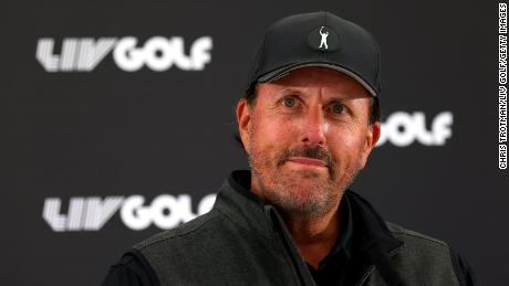 Mickelson looks on during a press conference.
