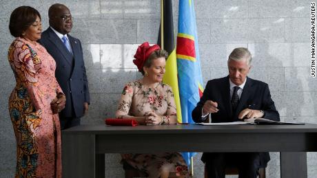 Democratic Republic of Congo President Felix Tshisekedi (second left) and his wife Denise Nyakeru Tshisekedi (far left) look on as Belgium&#39;s King Philippe (far right) and Queen Mathilde (second right) sign a guest book on June 8.
