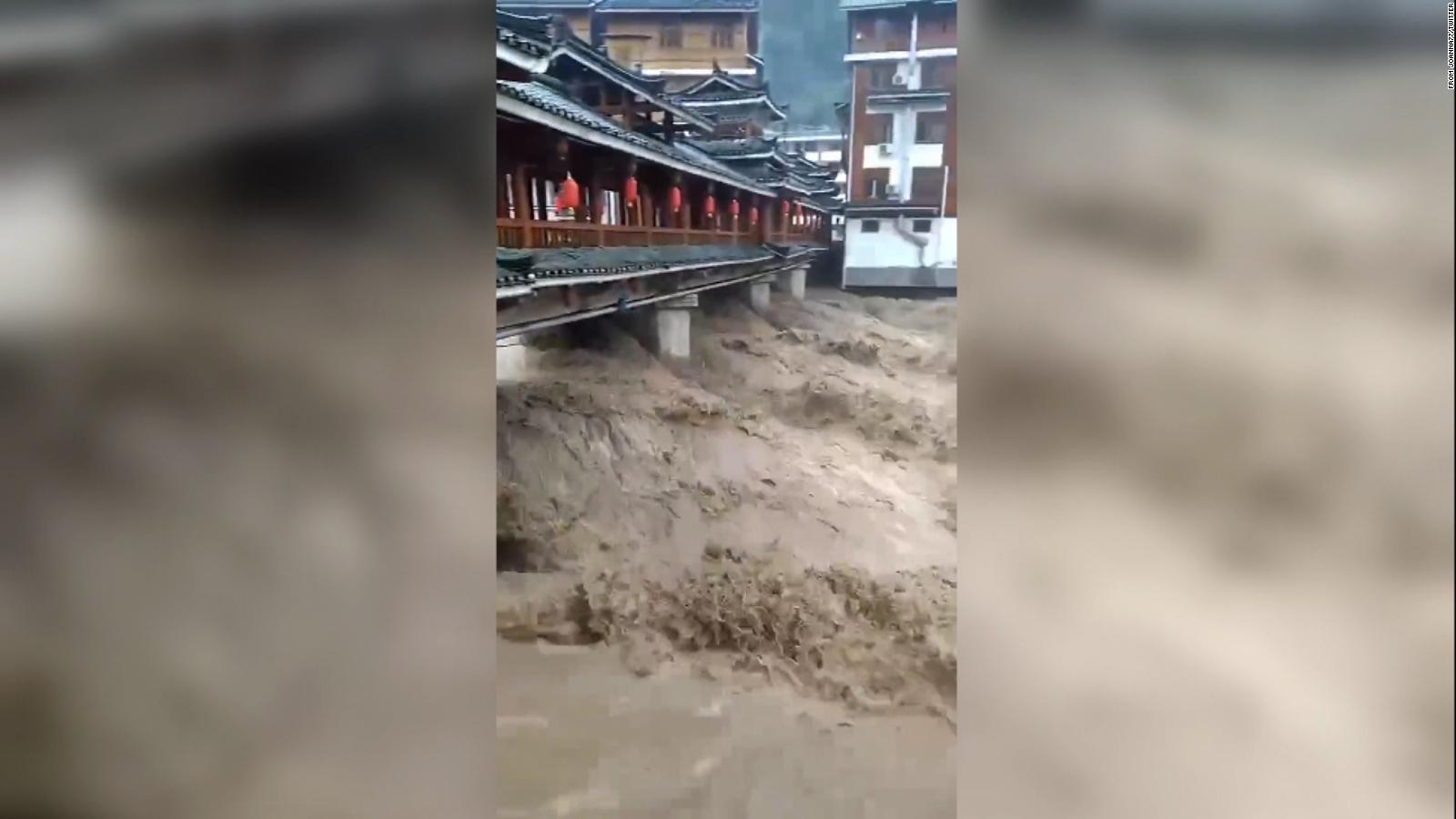 Torrential rains kill dozens in southern China as climate change ...