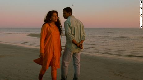 Choudhury and Washington walk along the beach in &quot;Mississippi Masala.&quot;