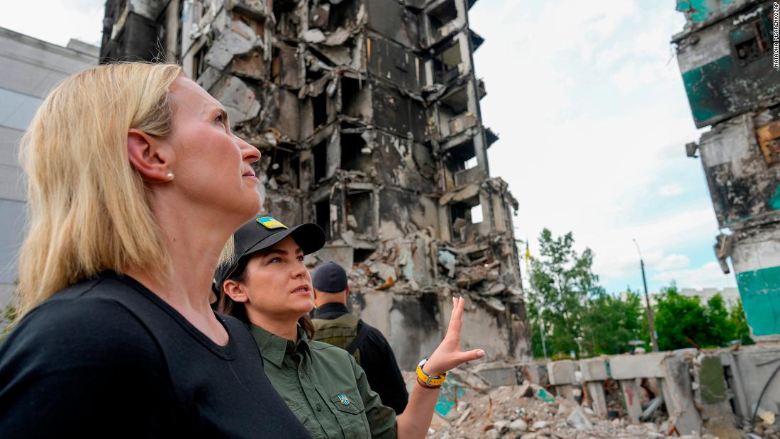 U.S. ambassador to Ukraine Bridget Brink, left, listens to Ukraine&#39;s Prosecutor General Iryna Venediktov during a tour of Borodyanka, Ukraine, on June 4.
