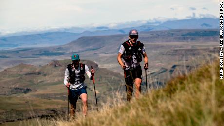 Sandes and Griesel look forward to spending more time on their home continent. Here they&#39;re pictured trekking up a steep incline during their Navigate Lesotho run.