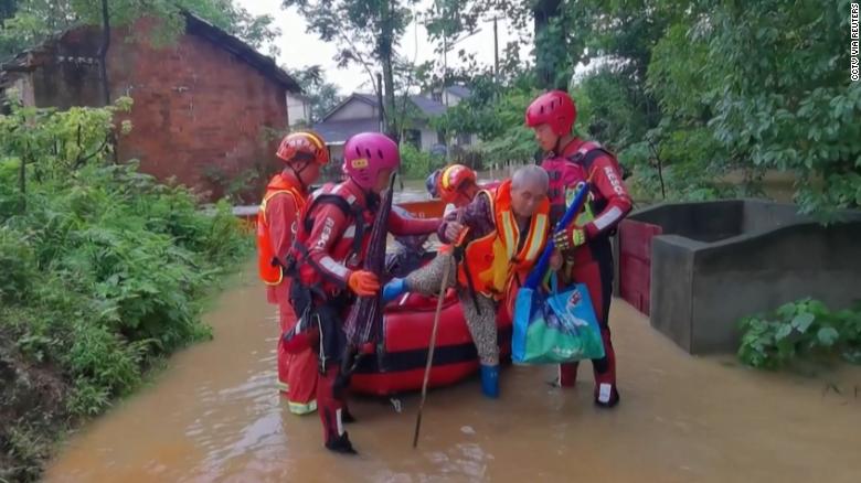 Hundreds of thousands evacuated as deadly rains hit China