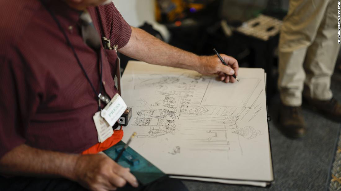 A sketch artist draws during the first hearing.