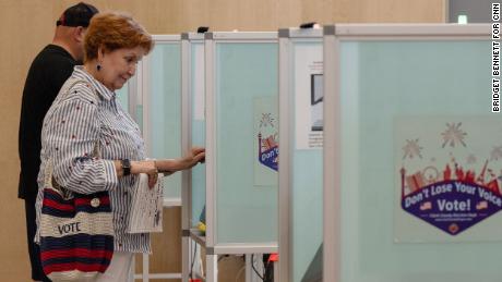 Donna West casts her ballot during early voting for Nevada&#39;s primary election on June 1, 2022 in Las Vegas, Nevada.