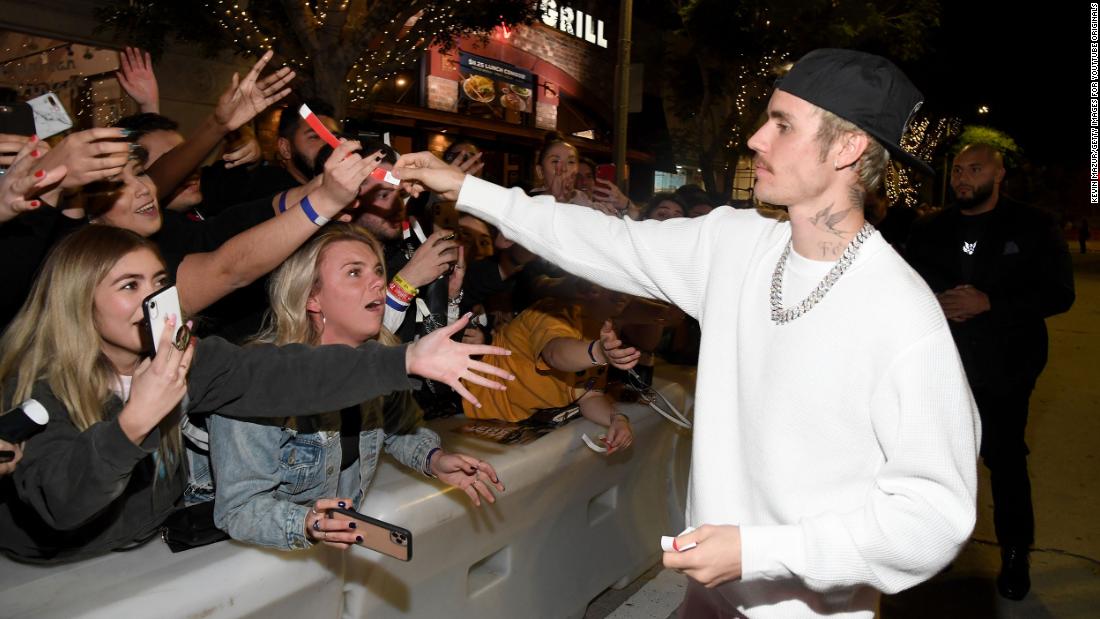 Bieber interacts with fans at the premiere of &quot;Justin Bieber: Seasons,&quot; a 10-part YouTube docuseries that debuted in January 2020. Earlier that month, he revealed that he had been recently &lt;a href=&quot;https://www.cnn.com/2020/01/08/entertainment/justin-bieber-lyme-disease-trnd/index.html&quot; target=&quot;_blank&quot;&gt;diagnosed with Lyme disease,&lt;/a&gt; an infection caused by bacteria commonly carried by ticks.