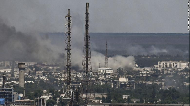 Black smoke and dirt rise from the nearby city of Severodonetsk during battle between Russian and Ukrainian troops in the eastern Ukraine region of Donbas on June 9, 2022.