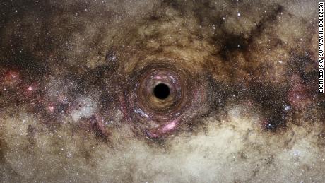 This is an artist's impression of a black hole passing through our Milky Way galaxy. 