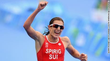 RIO DE JANEIRO, BRAZIL - AUGUST 20:  Nicola Spirig Hug of Switzerland celebrates as she approaches the line to win silver during the Women&#39;s Triathlon on Day 15 of the Rio 2016 Olympic Games at Fort Copacabana on August 20, 2016 in Rio de Janeiro, Brazil.  (Photo by Quinn Rooney/Getty Images)