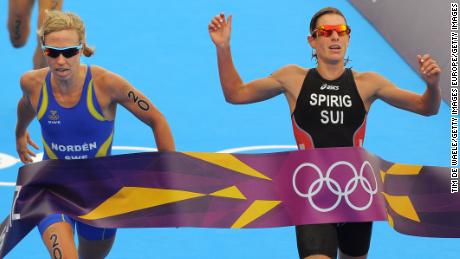 In perhaps the most dramatic finish triathlon ever, Spirig crosses the line slightly ahead of Lisa Norden in London. 