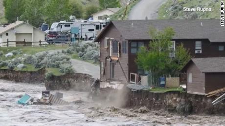 The flood caused part of a home in Gardiner, Montana, to fall into the water.