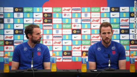 Gareth Southgate (left) and Harry Kane (right) speak to the media during a press conference on June 13, 2022 in Burton-upon-Trent, England. 